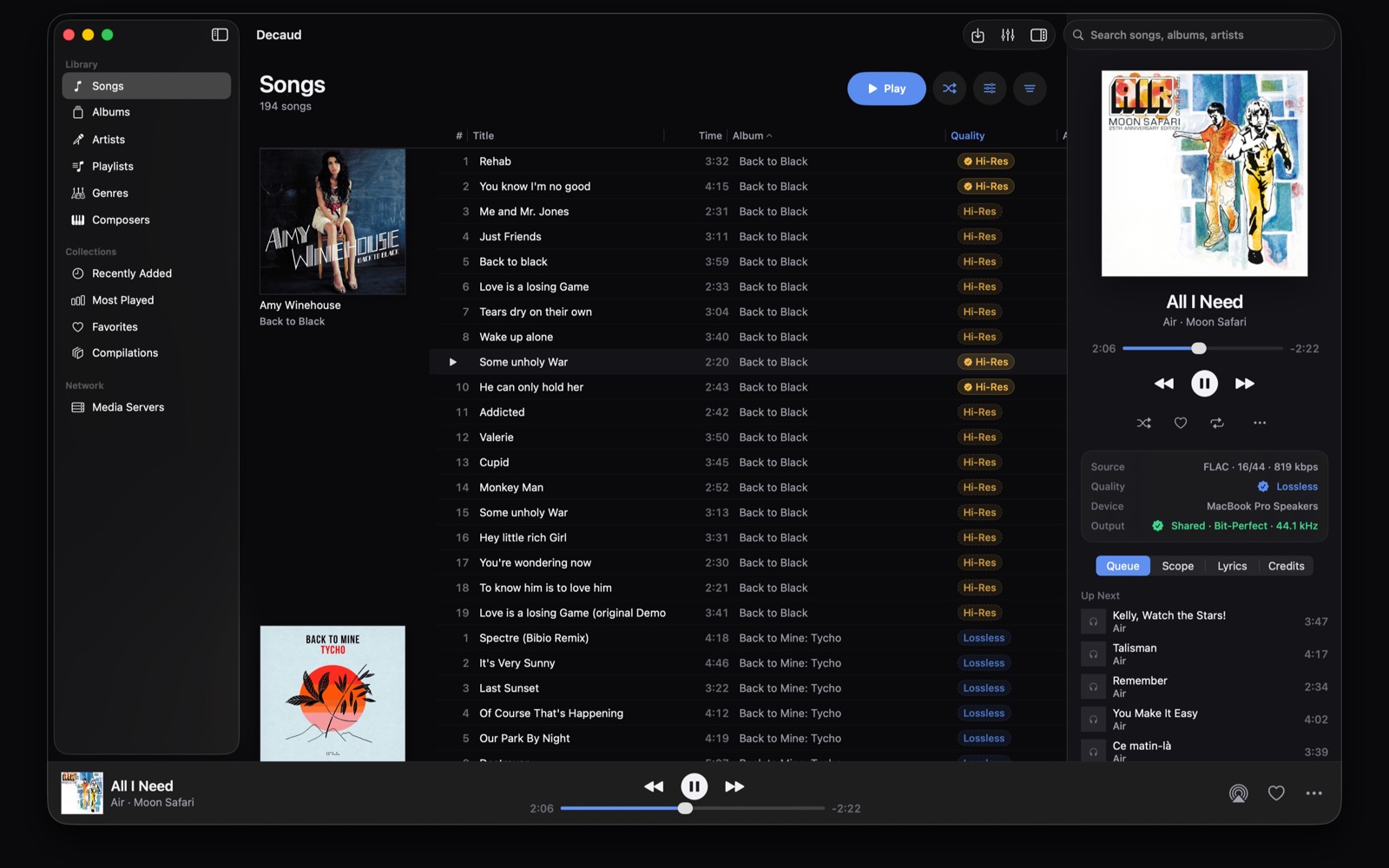 The Decaud library: album covers, the songs table with quality badges, and the now-playing rail